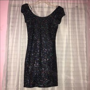 Fitted, multifaceted, sequins mini dress.